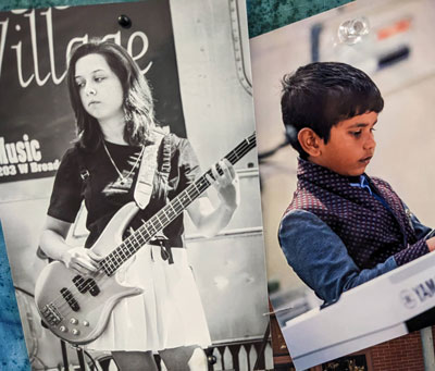 Female student plays bass guitar on stage